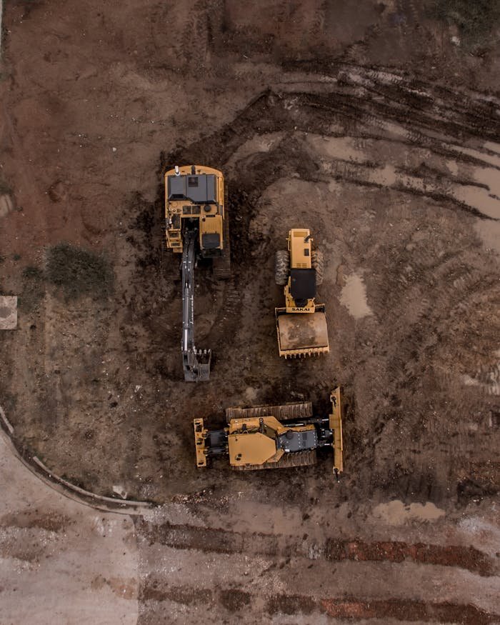 Home 7 Excavator and rollers preparing site — civil works and site development, cdo