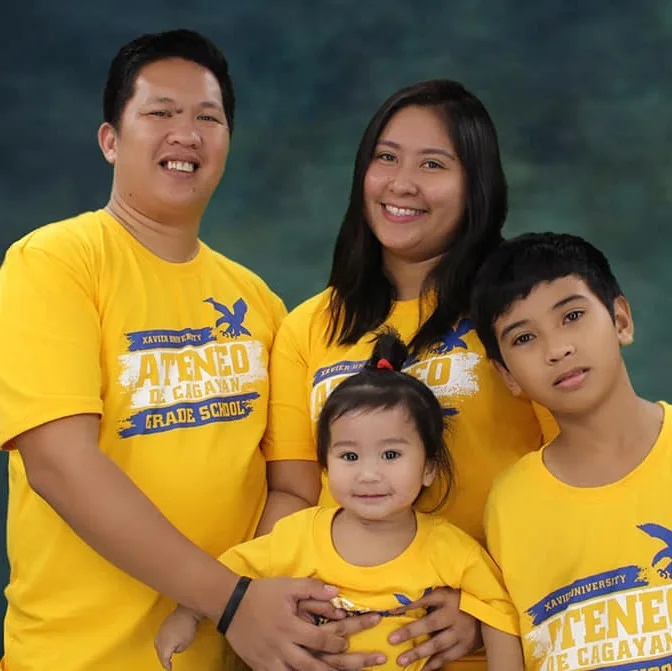 A family group picture of cesar jr. Andrin porras our structural engineer posing for a photo.