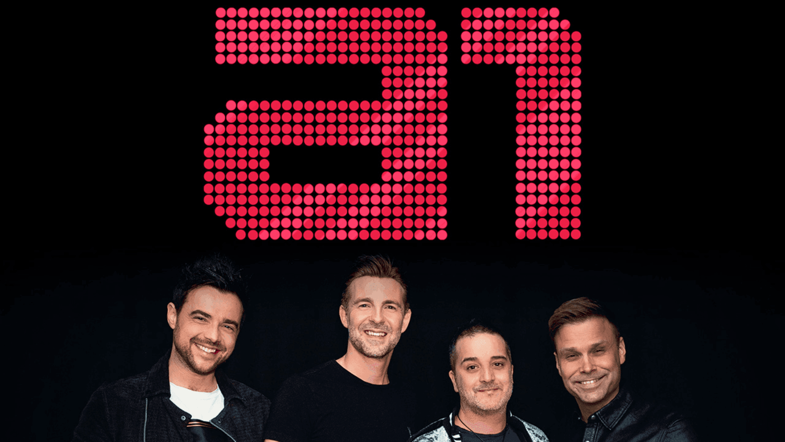 British-norwegian boy band a1 smiling in front of their iconic red dot logo.