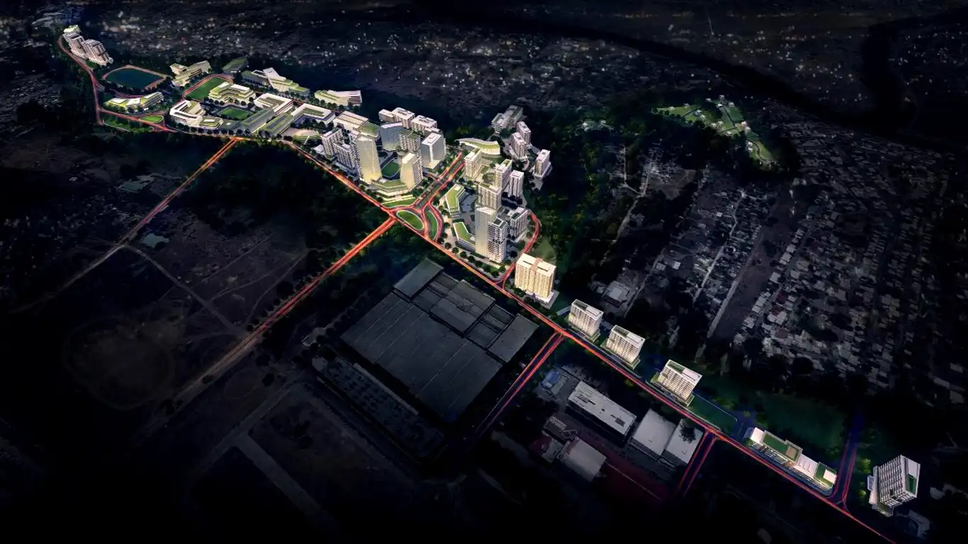 Aerial view of manresa town development in cagayan de oro city, featuring high-rise buildings and green spaces.