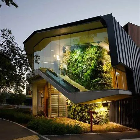 Green building comprehensive guide in cagayan de oro 3 A building with a staircase and plants in the front - green building comprehensive guide in cagayan de oro