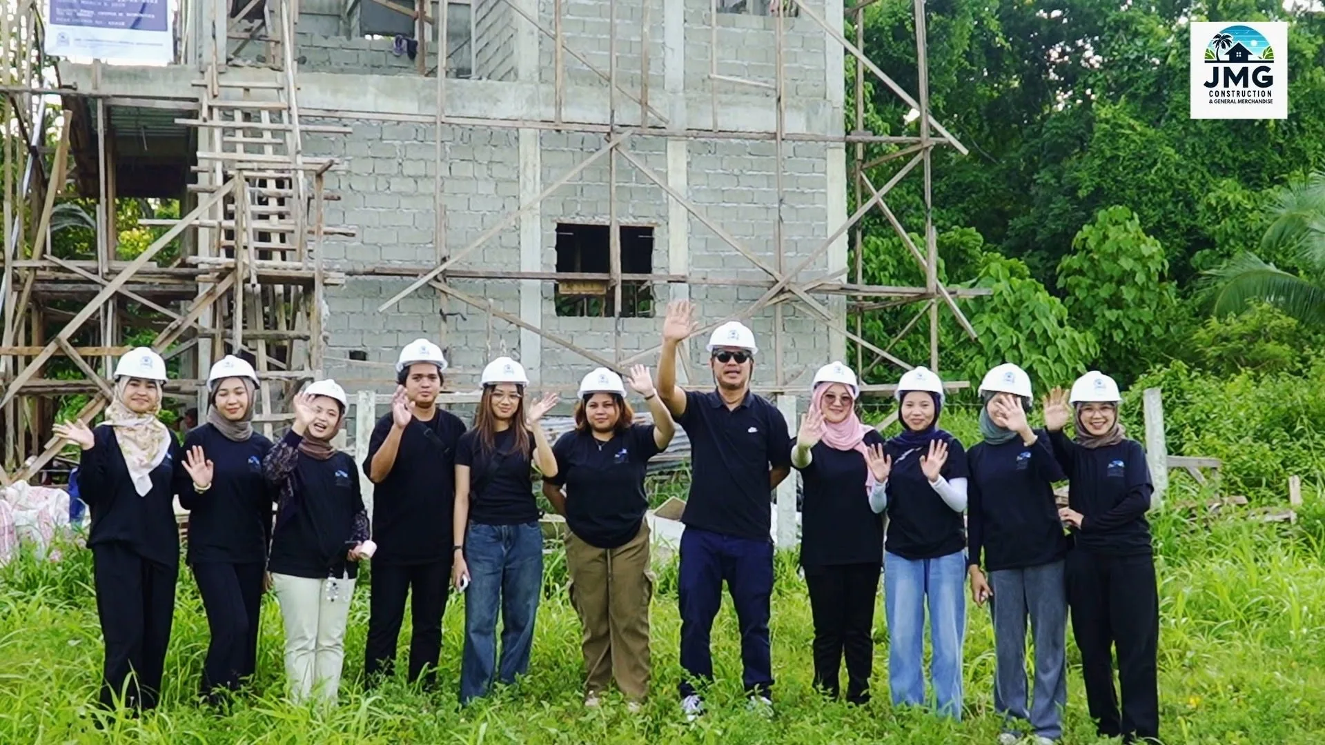 Jmg design & build team on-site at the el salvador project during the finishing and roofing stage of construction