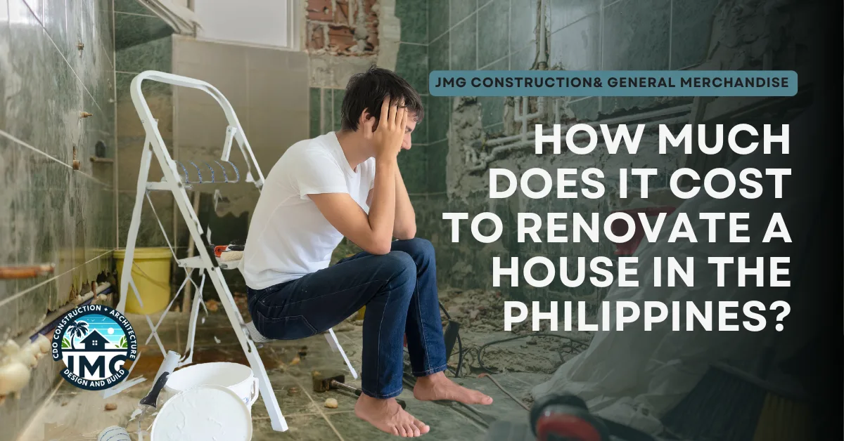 Jmg construction & general merchandise: the ultimate house renovation guide in the philippines 4 A frustrated man sits in a half-demolished bathroom surrounded by construction tools, paint buckets, and a ladder. The image features the text "how much does it cost to renovate a house in the philippines? " with the jmg construction & general merchandise branding in the top-left corner.