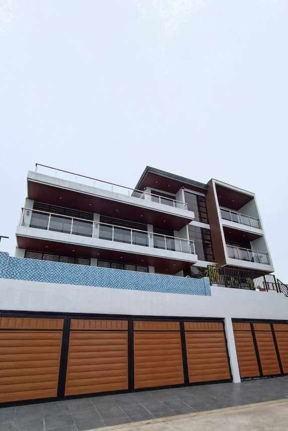 Teakwood hills luxury mansion – cagayan de oro 7 Full facade of a 4-storey modern mansion in teakwood hills