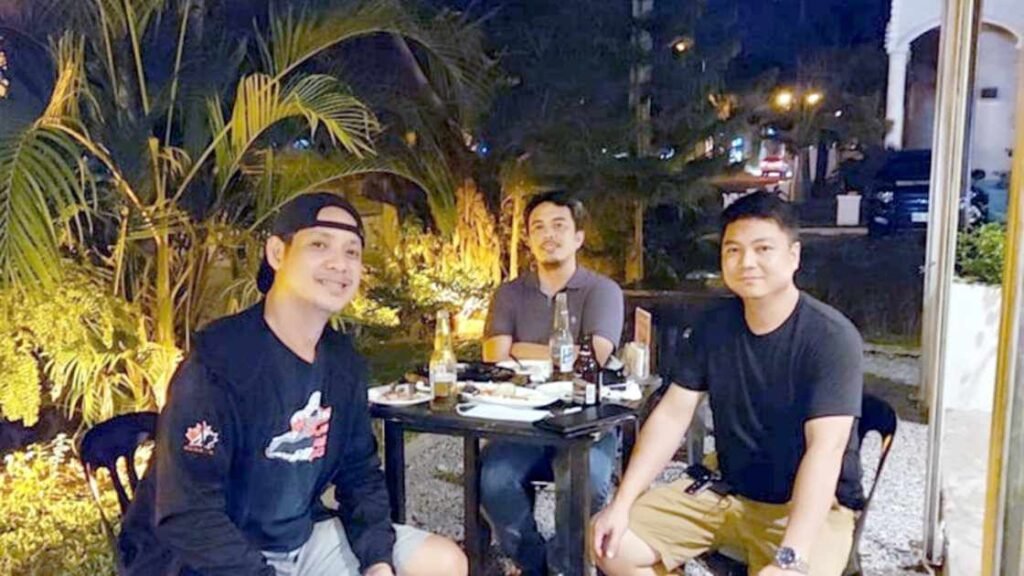 Teakwood hills luxury mansion – cagayan de oro 10 Engineers dining outdoors at night, enjoying a casual meal and catching up
