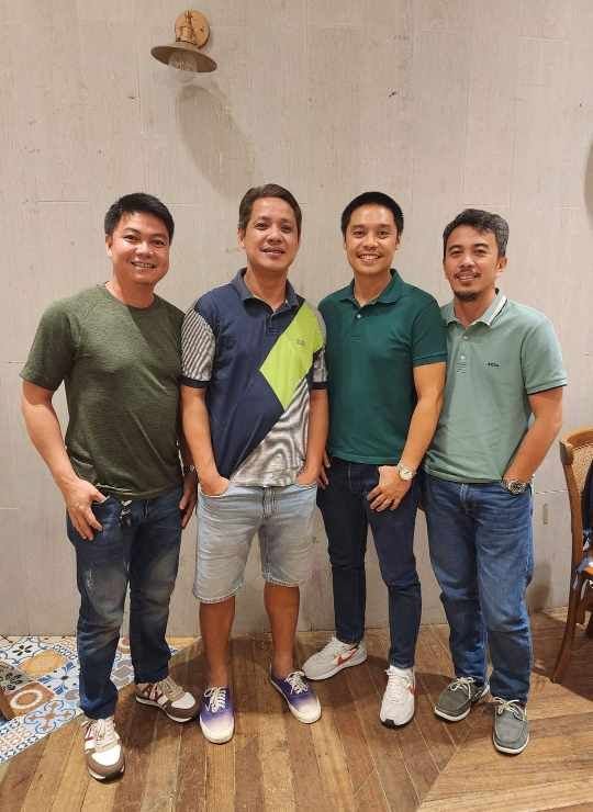 Teakwood hills luxury mansion – cagayan de oro 11 Four engineers posing indoors in casual wear with arms around each other