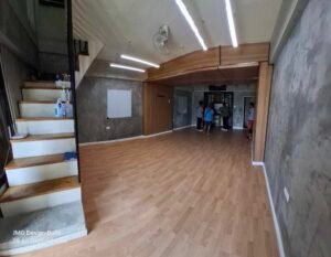Academy of emergency sciences cdo renovation begins 2 Side angle showing flooring and ceiling woodwork during aes cdo renovation