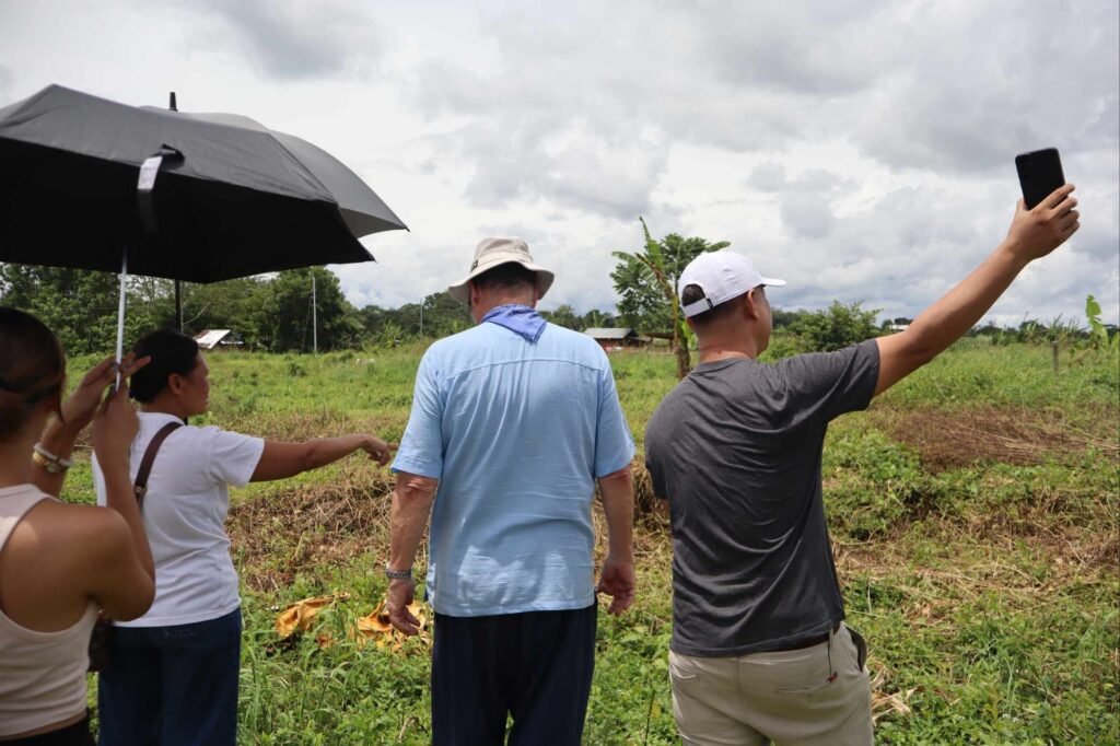 🚧 how contractors can spot toxic clients: a real case study from cagayan de oro 6 Contractor being guided by client pointing around the site.