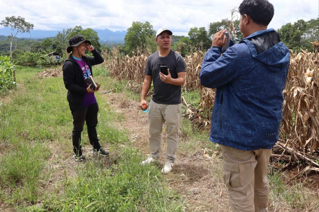🚧 how contractors can spot toxic clients: a real case study from cagayan de oro 9 Contractor photographing while client explains during farm visit.