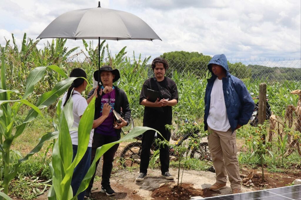🚧 how contractors can spot toxic clients: a real case study from cagayan de oro 4 Group standing under an umbrella during field consultation with the client.