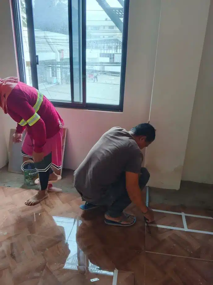 Bedroom floor tile layout and alignment checks for Villanueva interior fit-out