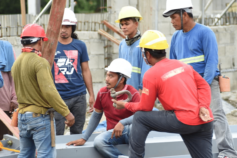 Warehouse construction company philippines construction team on industrial project site