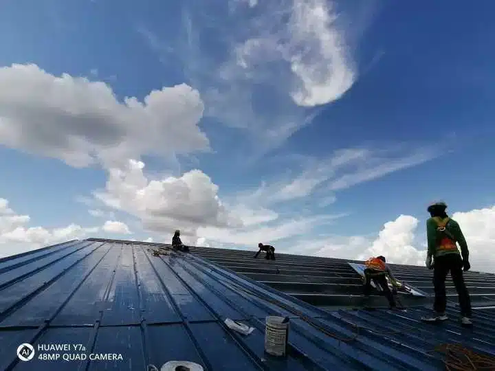 Warehouse construction company philippines roof installation for industrial warehouse project