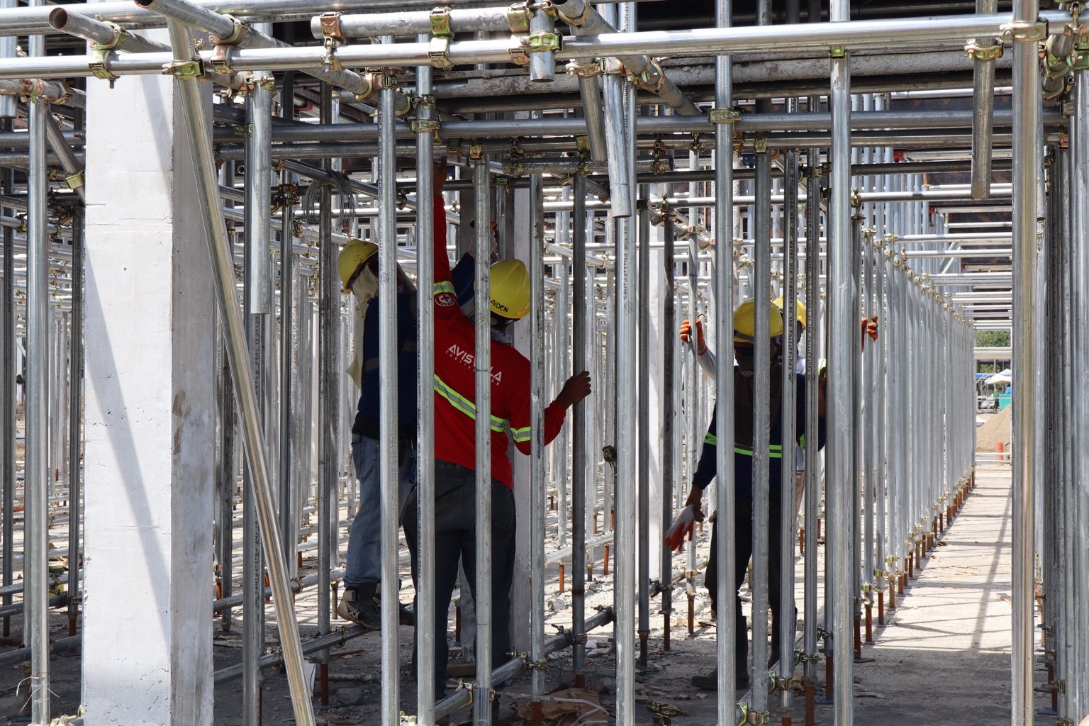 Northern mindanao fire safety 2026: what cdo builders should learn from 644 fire incidents 5 Workers check the steel shoring system beneath a slab at a jmg tagoloan project